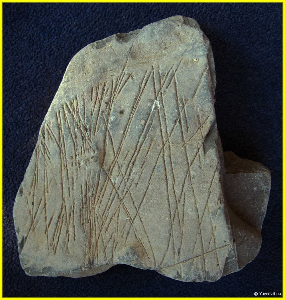 Камінь із загадковими знаками в Одаєві